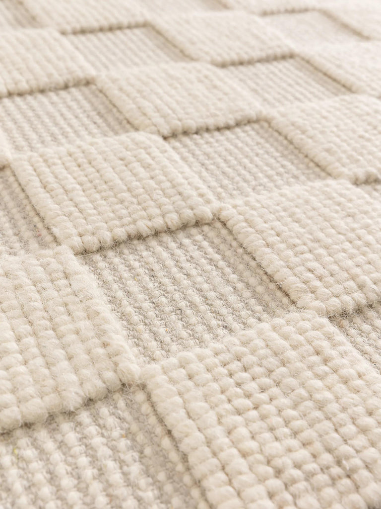 Tapis moderne motif géométrique damier crème 120x170 cm