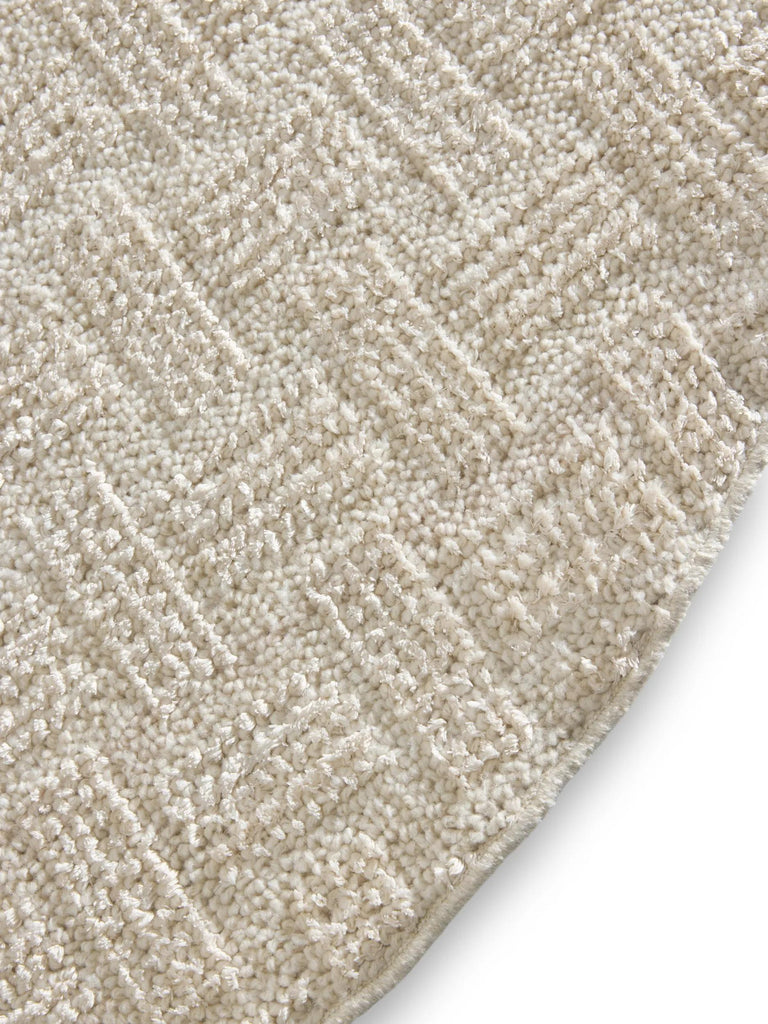 Tapis moderne tressé rond crème 160 cm de diamètre