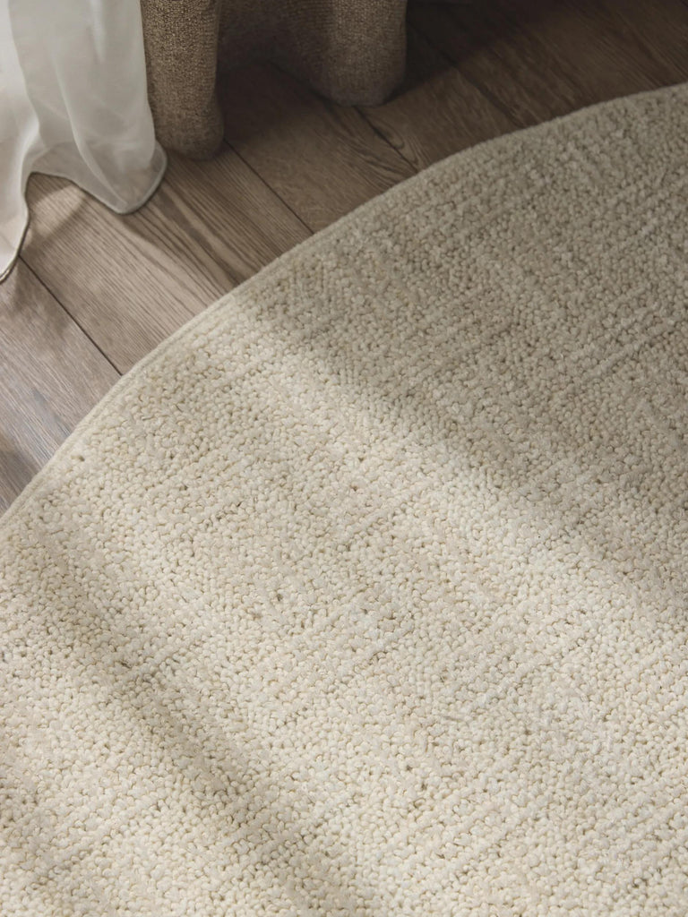 Tapis moderne tressé rond crème 160 cm de diamètre