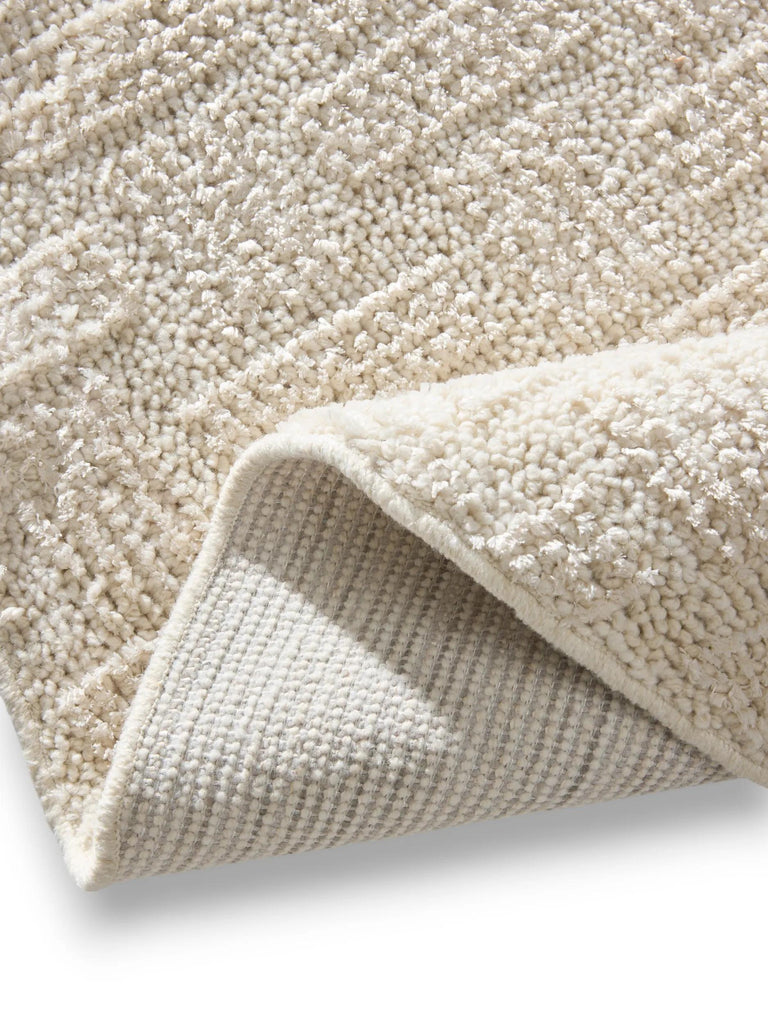 Tapis moderne tressé rond crème 160 cm de diamètre