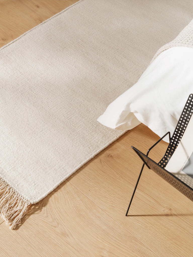 Tapis scandinave uni à franges descente de lit crème en laine 80x250 cm