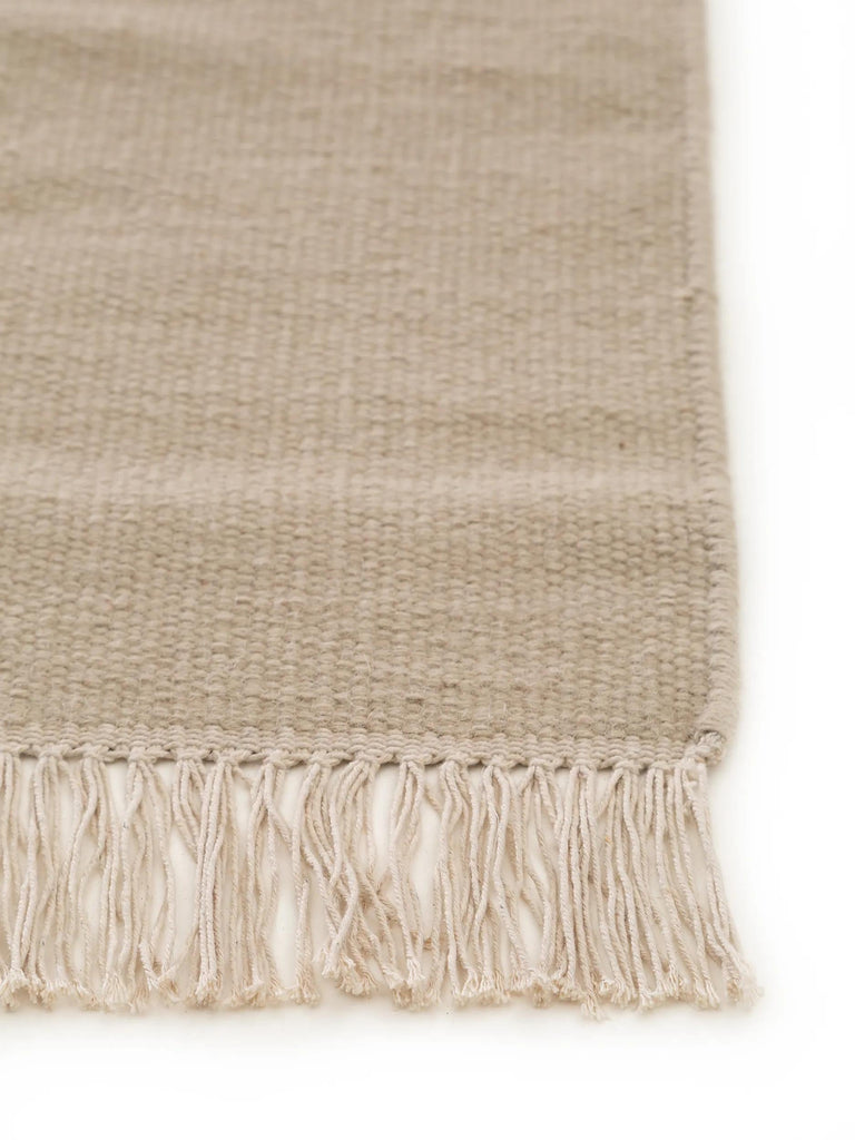Tapis scandinave uni à franges descente de lit beige en laine 80x250 cm
