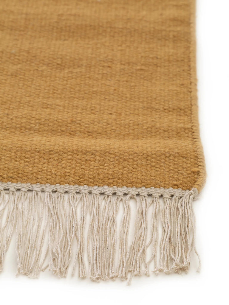 Tapis scandinave uni à franges descente de lit terracotta en laine 70x200 cm