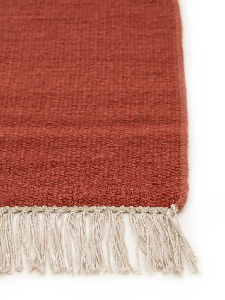 Tapis scandinave uni à franges descente de lit rouge brique en laine 70x200 cm