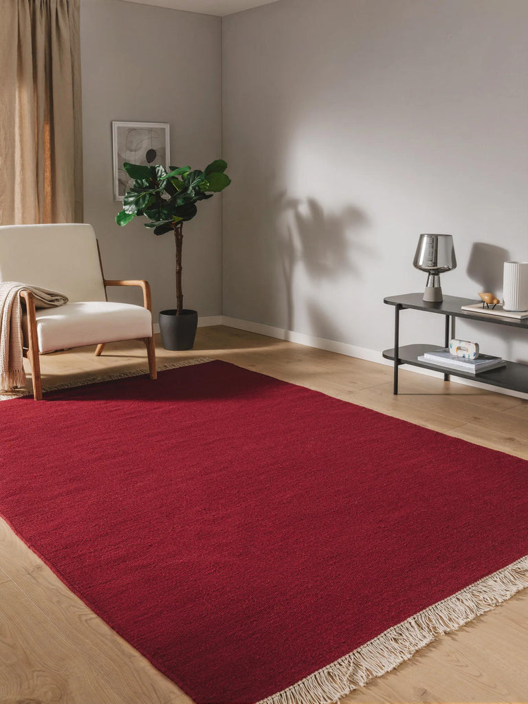Tapis scandinave uni à franges bordeaux en laine 120x170 cm