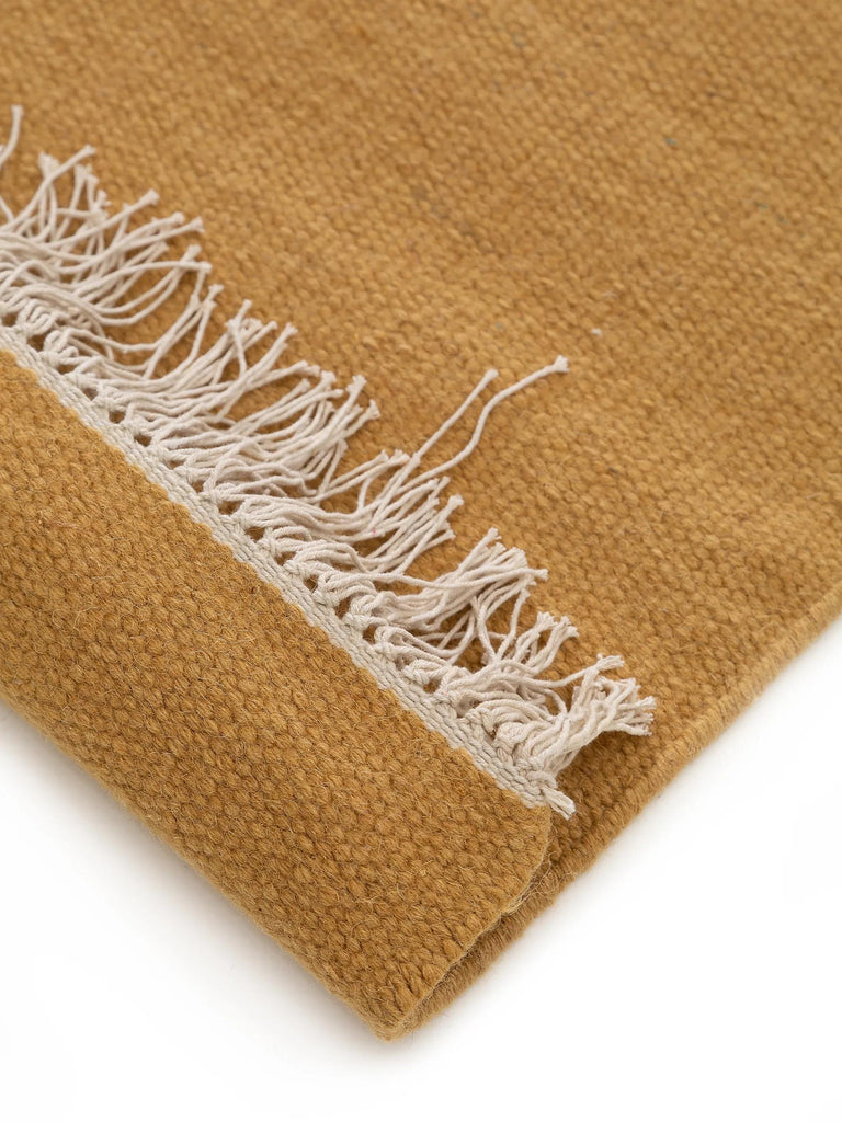 Tapis scandinave uni à franges descente de lit terracotta en laine 80x250 cm