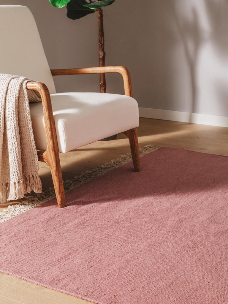Tapis scandinave uni à franges rose en laine 80x150 cm