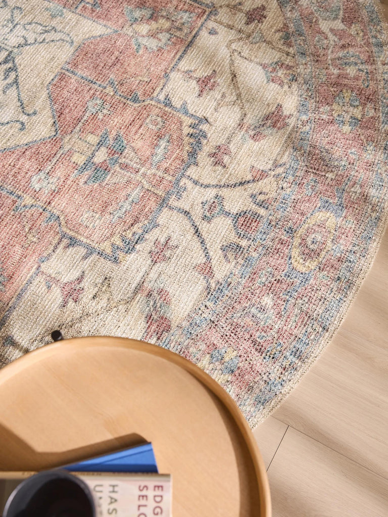 Tapis vintage inspiration oriental rond rouge et beige 240 cm de diamètre