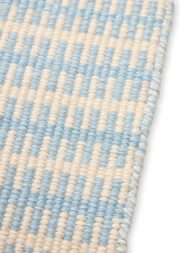 Tapis contemporain à franges enfant bleu et crème en laine 160x230 cm