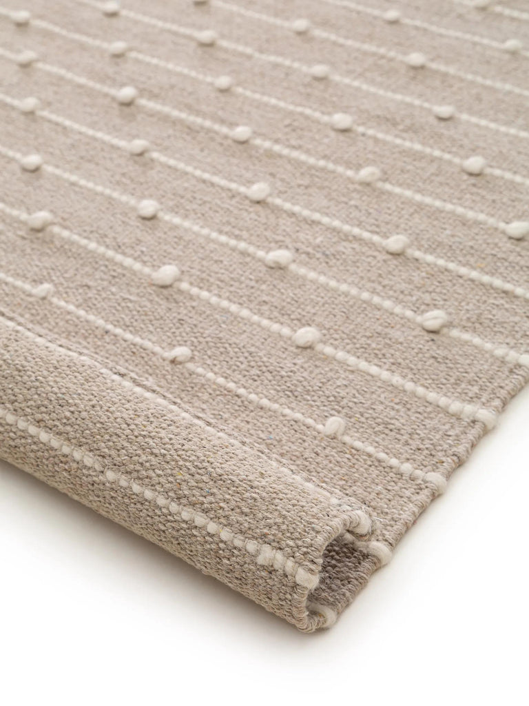 Tapis scandinave perlé enfant beige en coton 80x120 cm