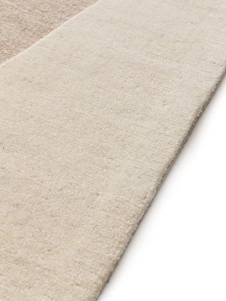 Tapis géométrique moderne beige et crème en laine 120x170 cm