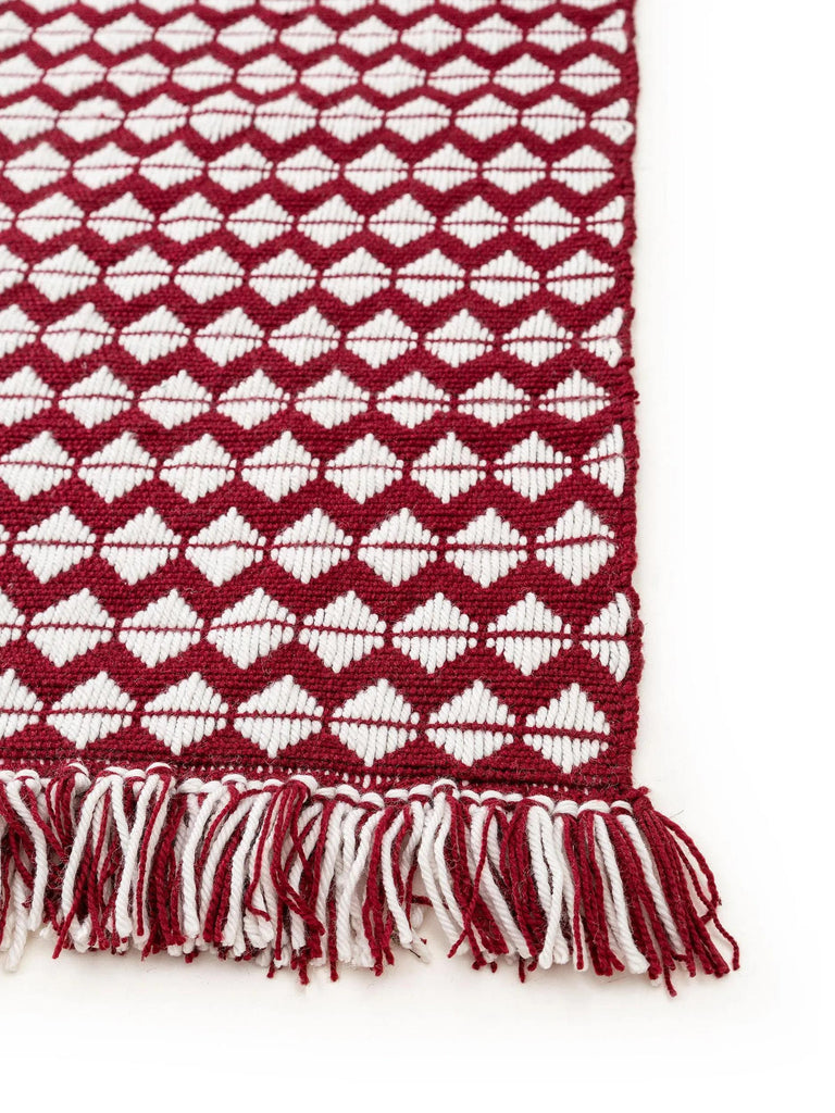 Tapis géométrique à franges rouge et blanc 120x170 cm
