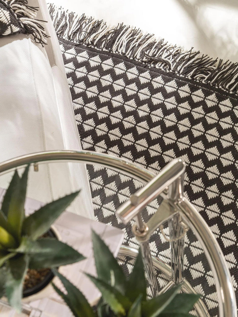 Tapis géométrique à franges noir et blanc 120x170 cm