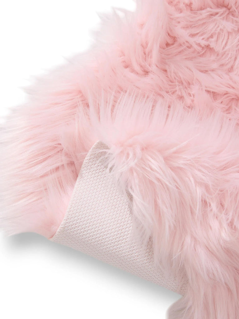 Tapis shaggy forme fausse fourrure rose poudré 60x90 cm