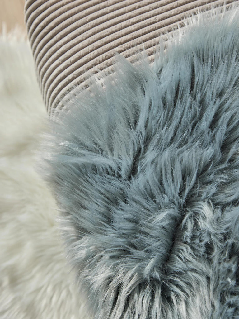 Tapis shaggy forme fausse fourrure bleu 60x90 cm