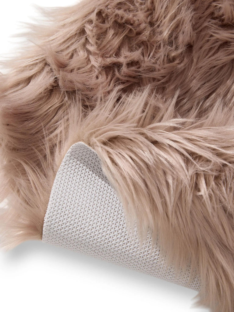 Tapis shaggy forme fausse fourrure beige 60x90 cm