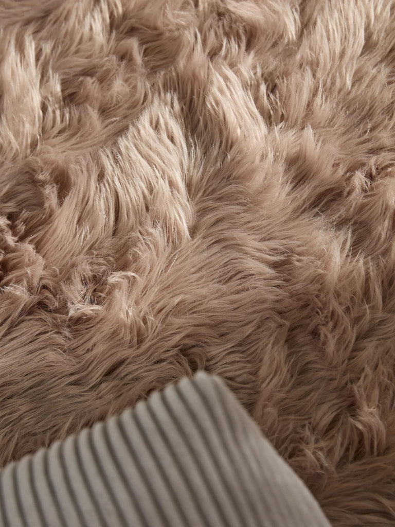 Tapis shaggy effet fourrure rond beige 120 cm de diamètre