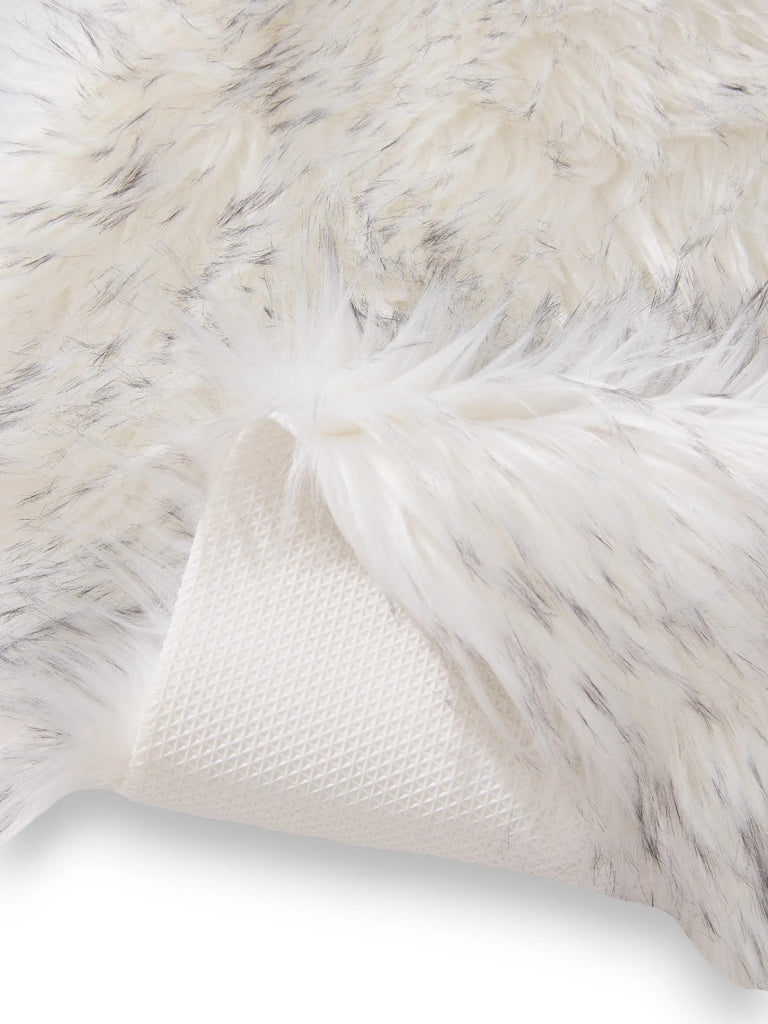 Tapis shaggy forme fausse fourrure noir et blanc 60x90 cm