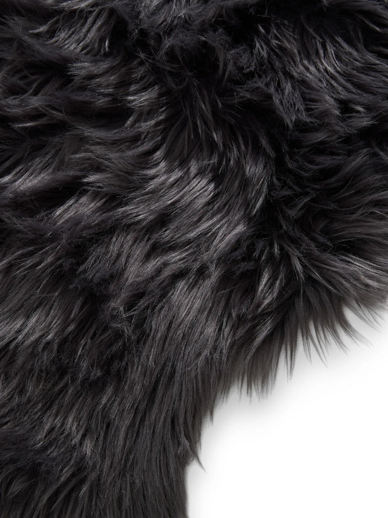 Tapis shaggy forme fausse fourrure noir charbon 60x90 cm