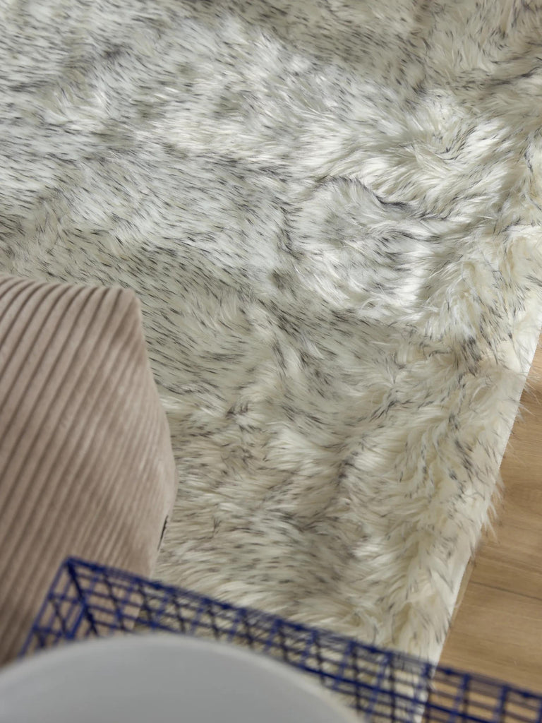 Tapis shaggy effet fourrure noir et blanc 60x120 cm