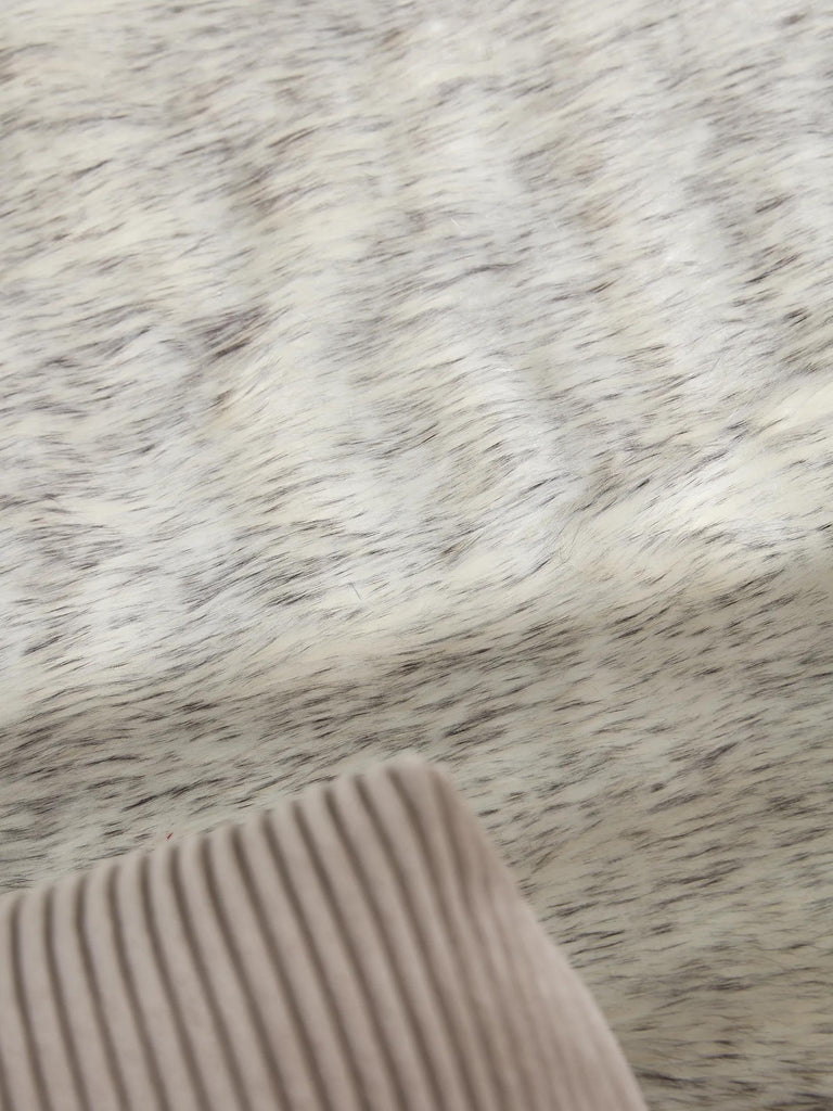 Tapis shaggy effet fourrure rond noir et blanc 120 cm de diamètre