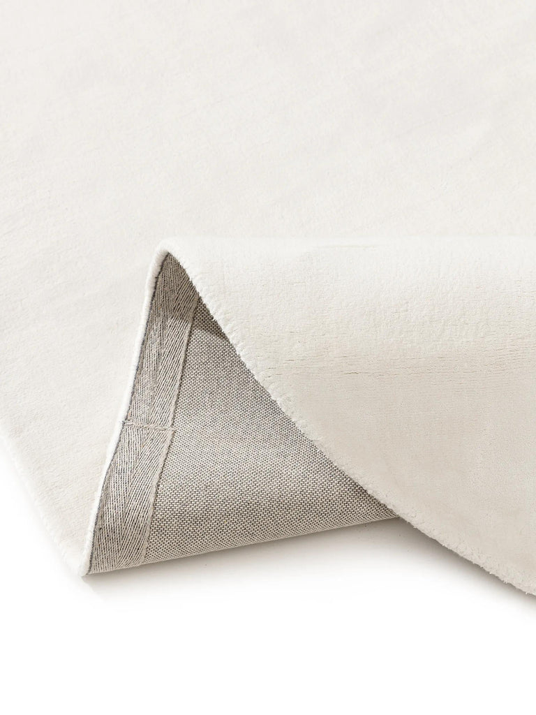 Tapis moderne uni ovale crème  150x230 cm