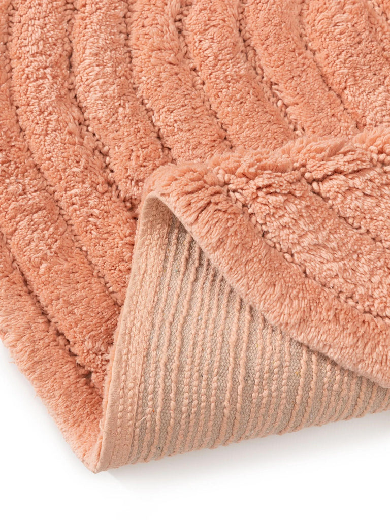Tapis géométrique de bain orange pêche en coton 50x80 cm