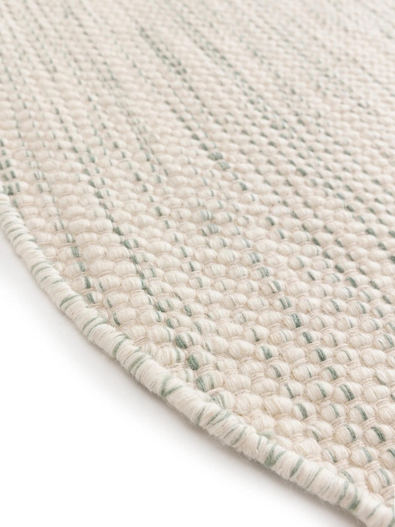 Tapis scandinave tressé rond enfant crème et gris en laine 100 cm de diamètre