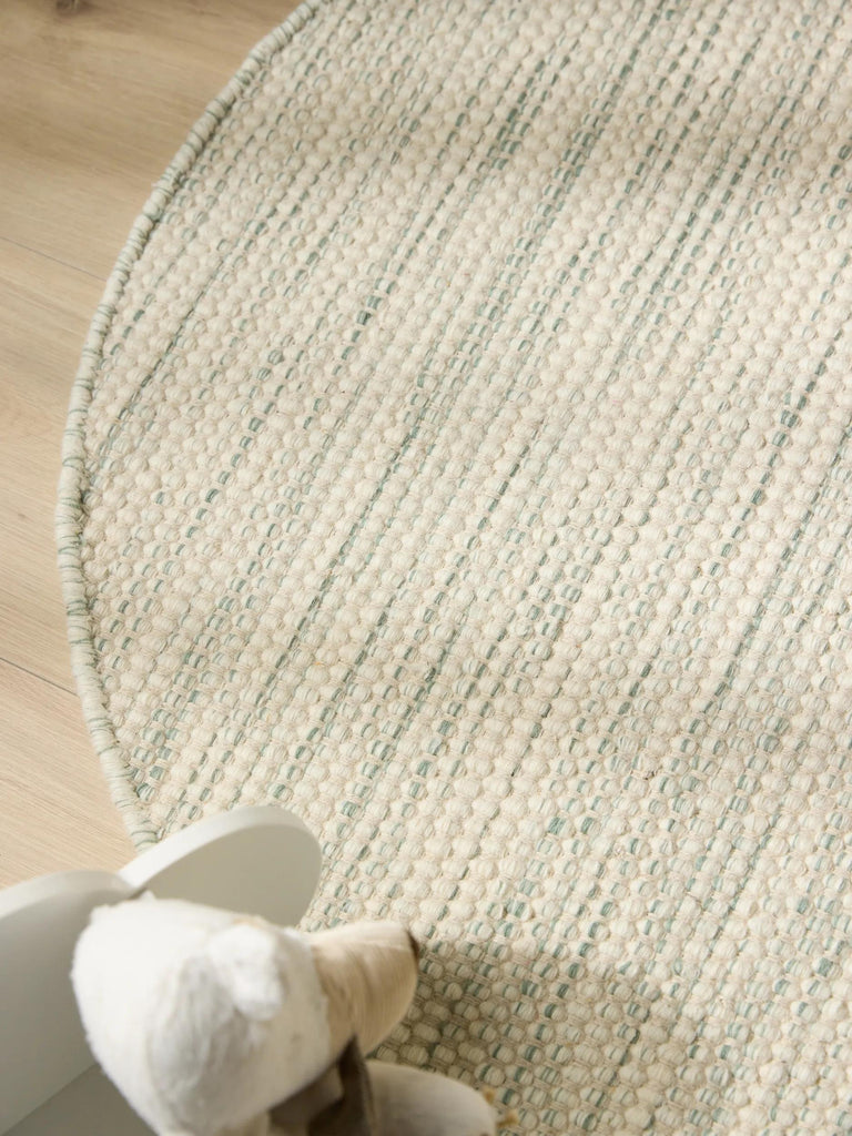 Tapis scandinave tressé rond enfant crème et gris en laine 100 cm de diamètre
