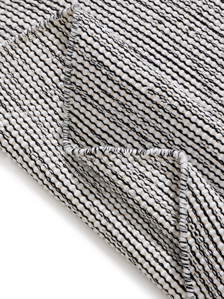 Tapis scandinave tressé en cercle rond noir et blanc en coton 160 cm de diamètre