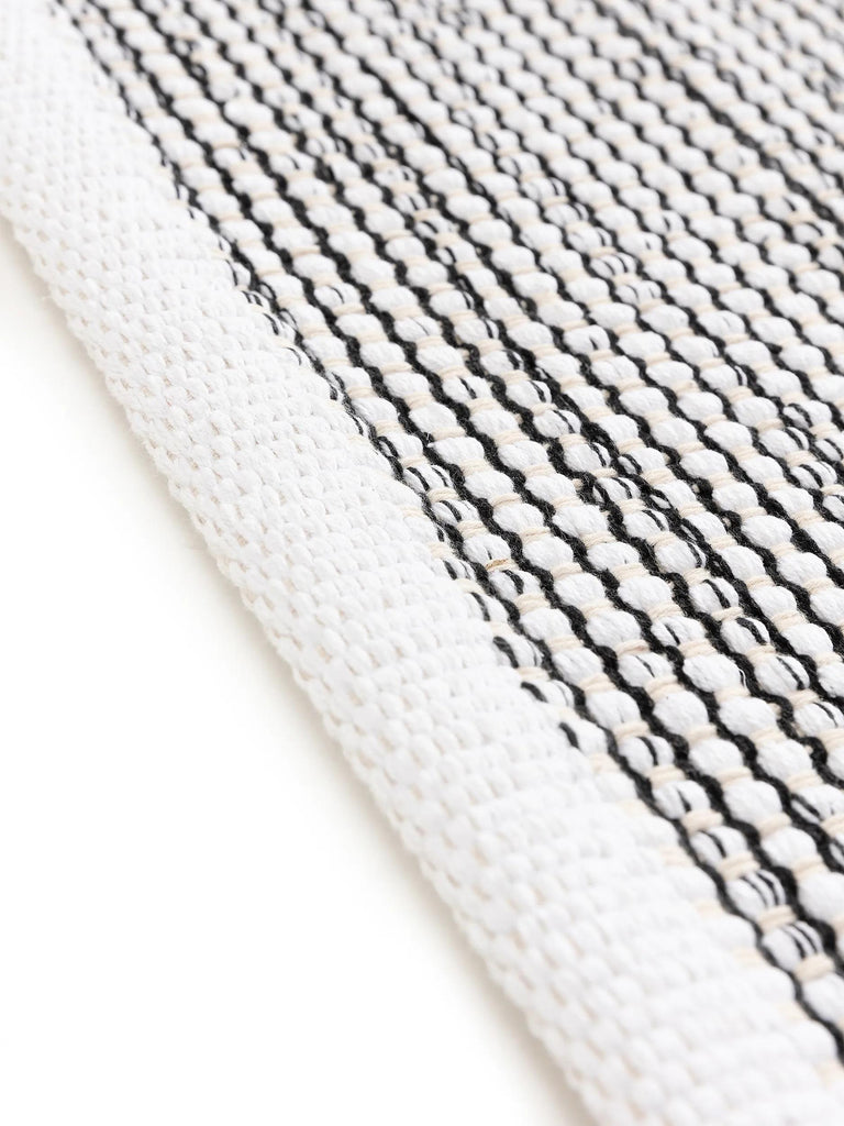 Tapis scandinave tressé en cercle noir et blanc en coton 70x140 cm