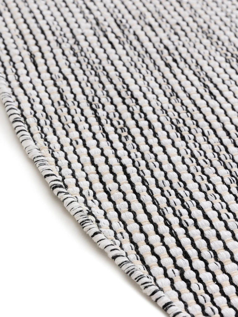Tapis scandinave tressé en cercle rond noir et blanc en coton 120 cm de diamètre