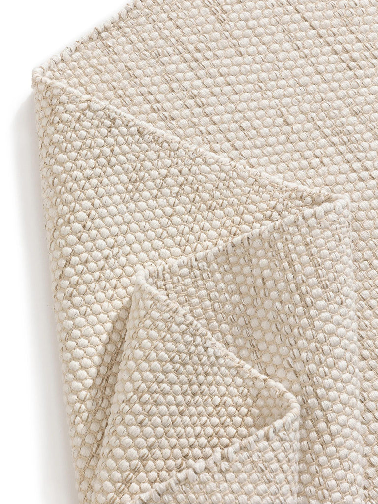 Tapis scandinave tressé en cercle crème en coton 120x170 cm