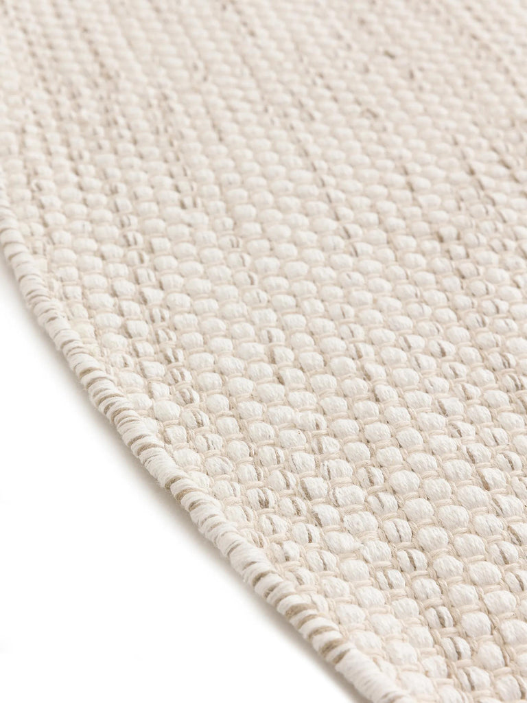 Tapis scandinave tressé en cercle rond crème en coton 240 cm de diamètre