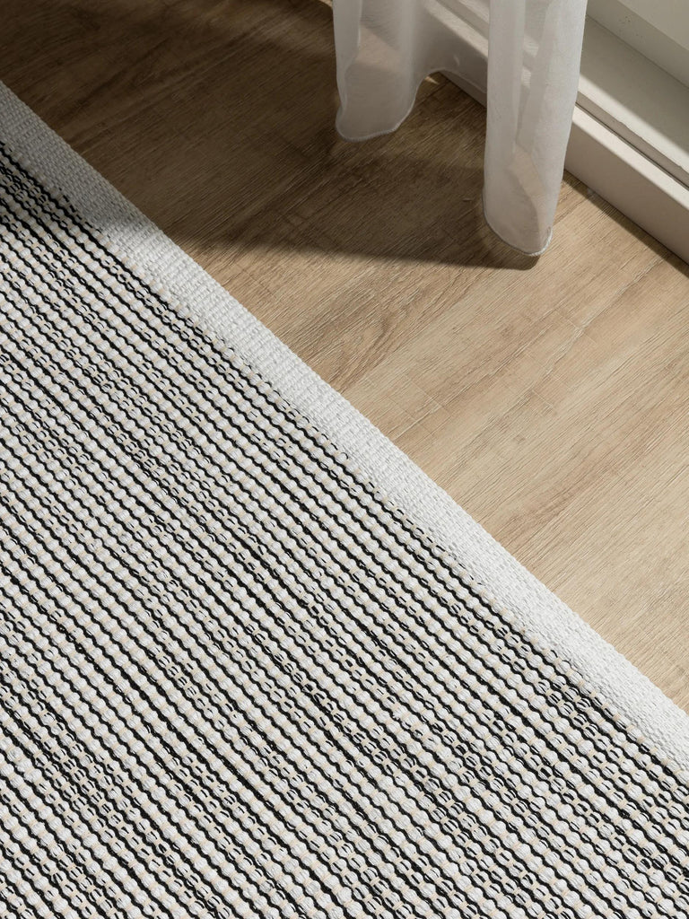 Tapis scandinave tressé en cercle noir et blanc en coton 200x290 cm