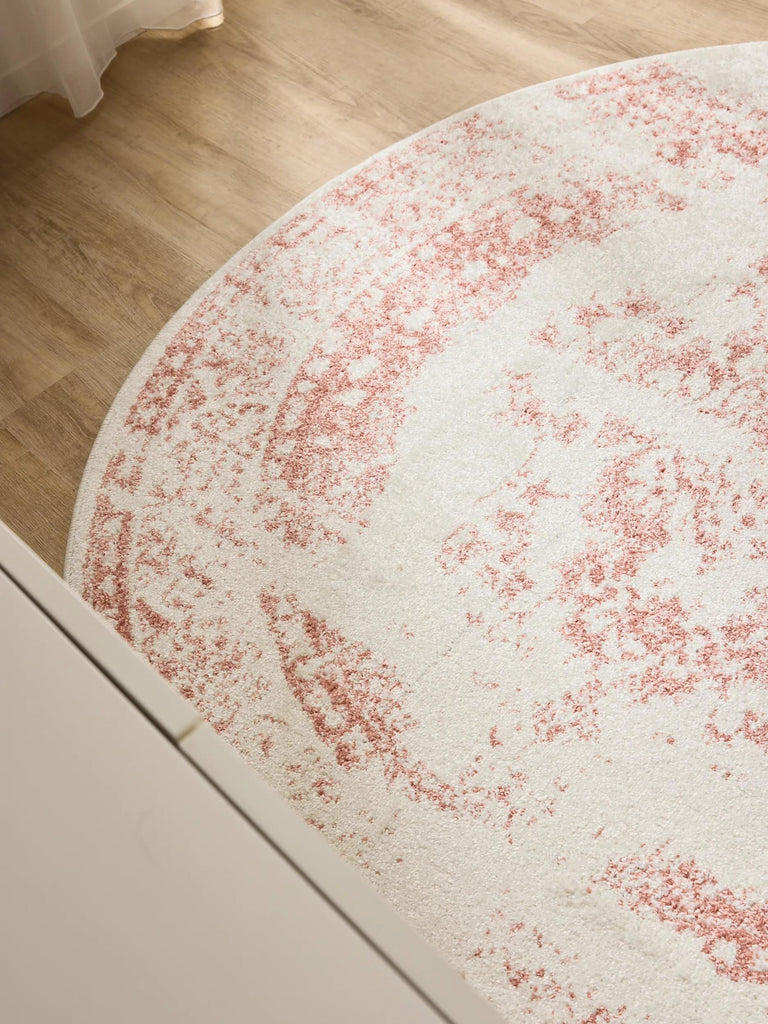 Tapis vintage motif oriental rond blanc et terracotta 160 cm de diamètre