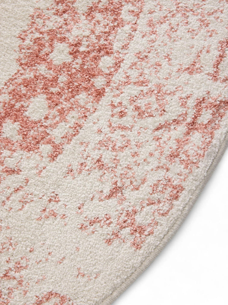 Tapis vintage motif oriental rond blanc et terracotta 160 cm de diamètre