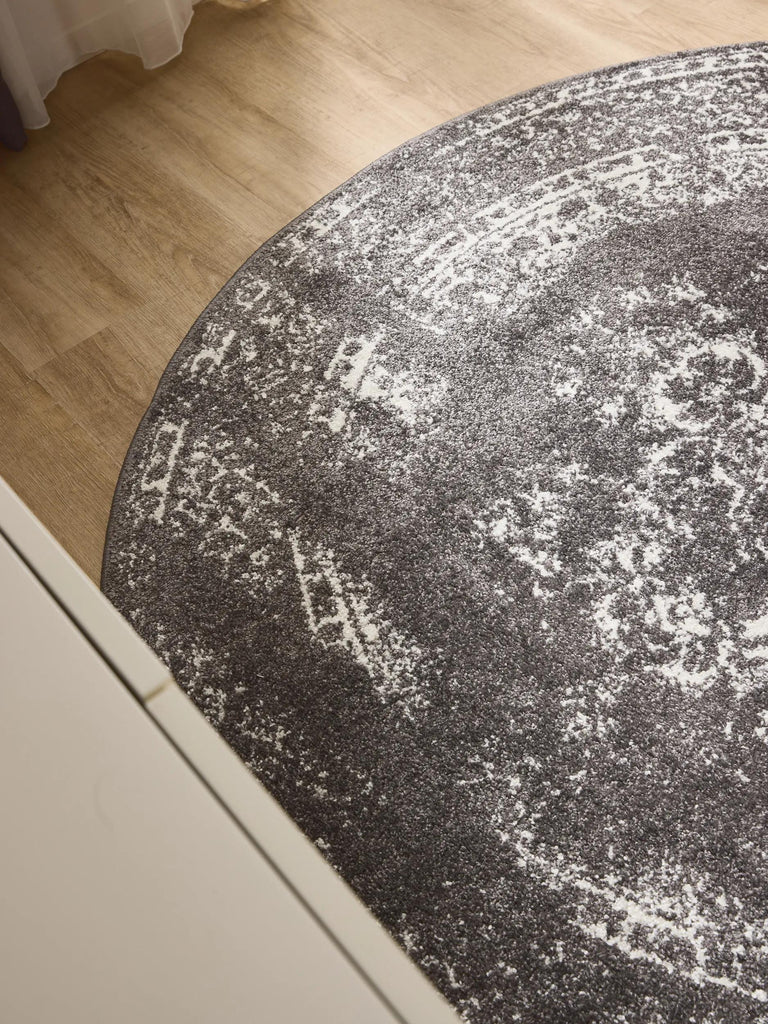 Tapis vintage motif oriental rond gris 120 cm de diamètre