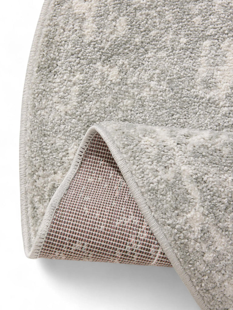 Tapis vintage motif oriental rond taupe 120 cm de diamètre