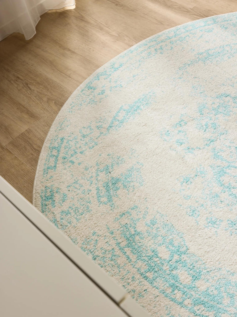 Tapis vintage motif oriental rond blanc et turquoise 160 cm de diamètre