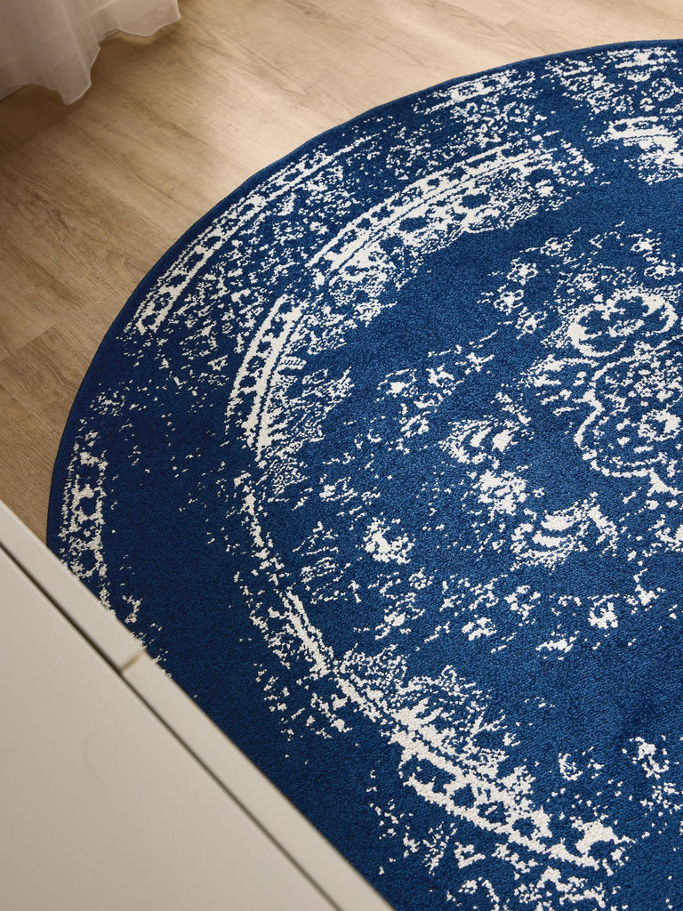 Tapis vintage motif oriental rond bleu foncé 120 cm de diamètre