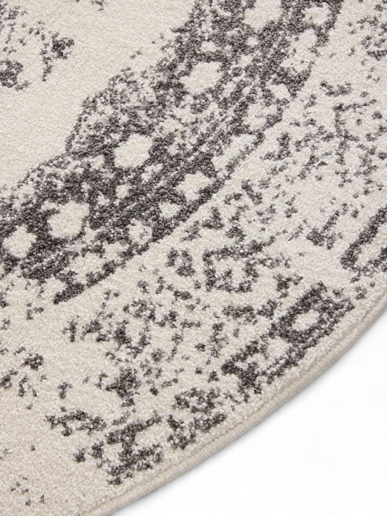 Tapis vintage motif oriental rond beige et gris 160 cm de diamètre