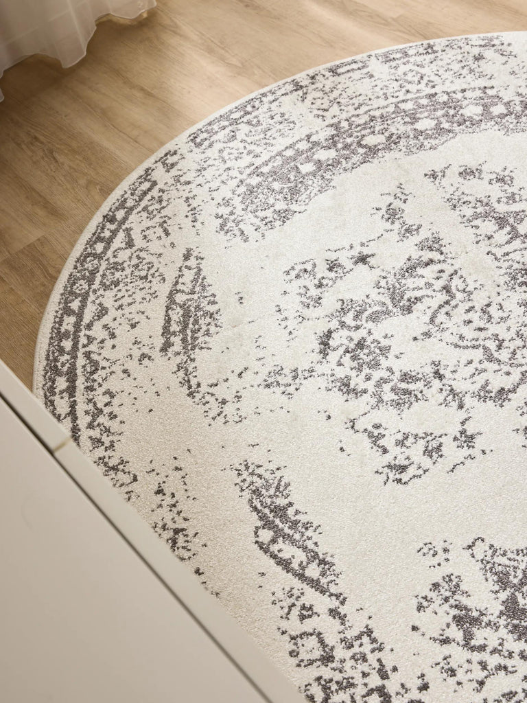 Tapis vintage motif oriental rond beige et gris 160 cm de diamètre