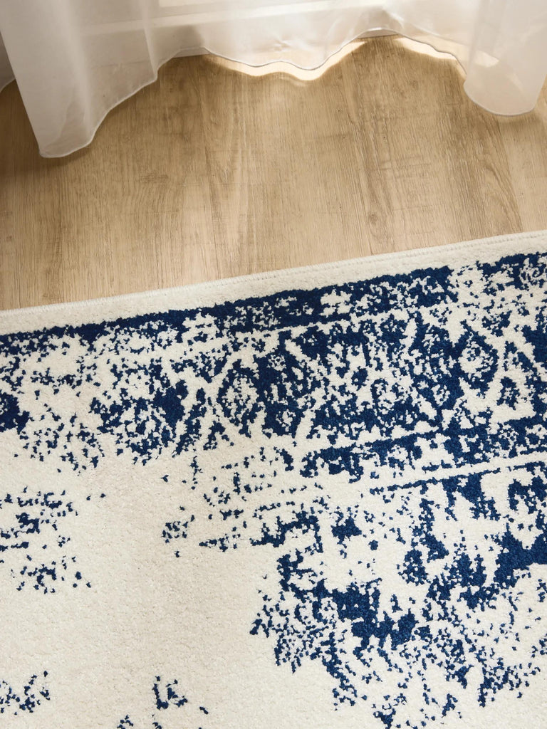 Tapis vintage motif oriental blanc et bleu foncé 200x300 cm