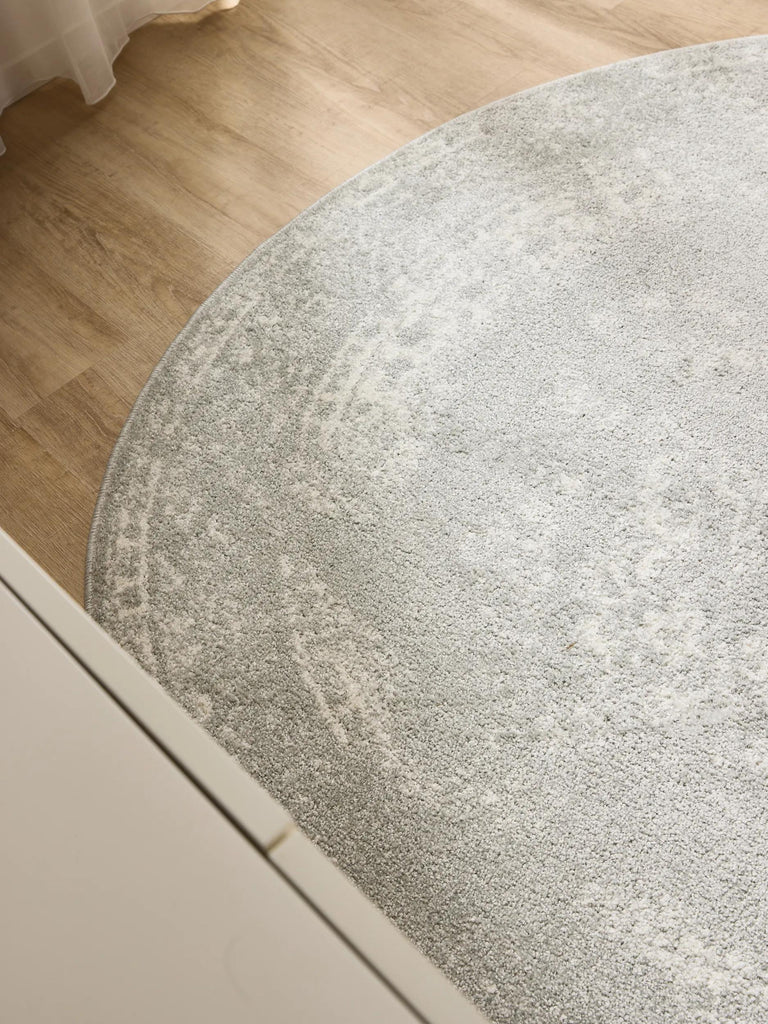 Tapis vintage motif oriental rond taupe 160 cm de diamètre