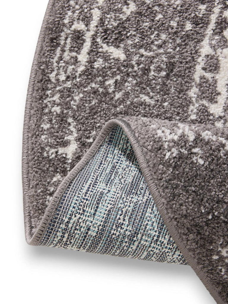 Tapis vintage motif oriental rond gris 160 cm de diamètre