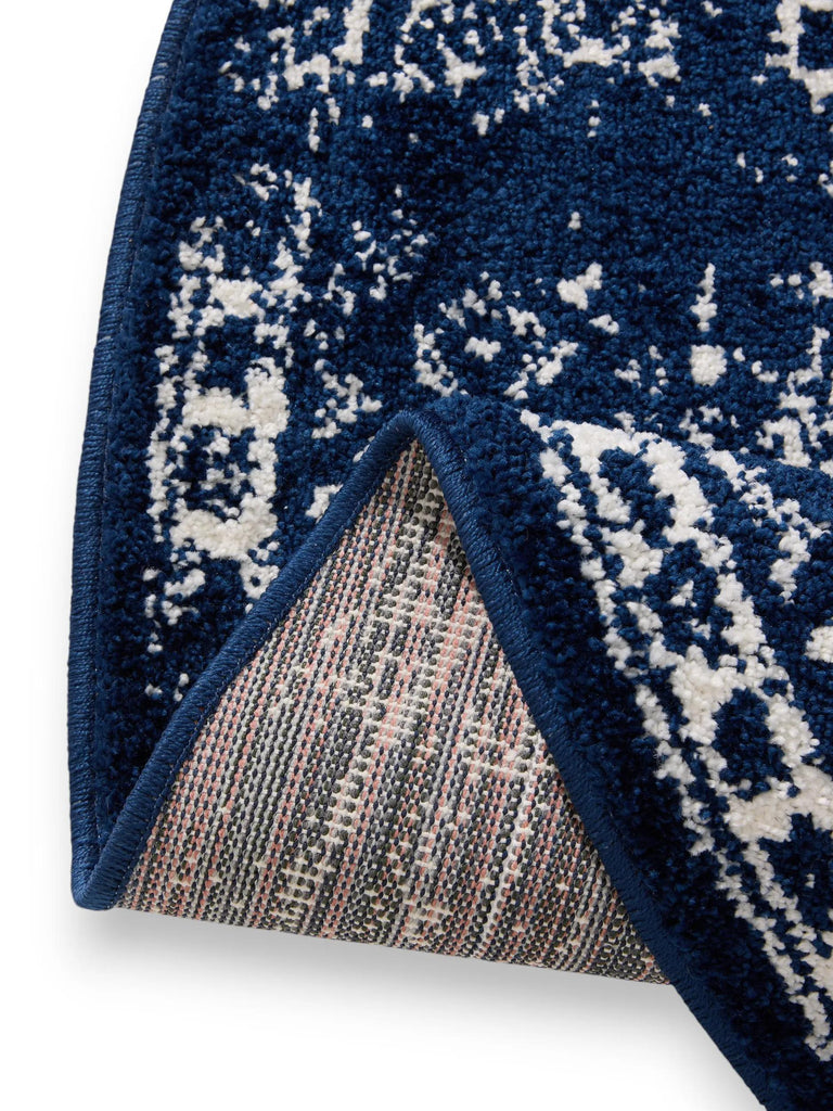 Tapis vintage motif oriental rond bleu foncé 120 cm de diamètre