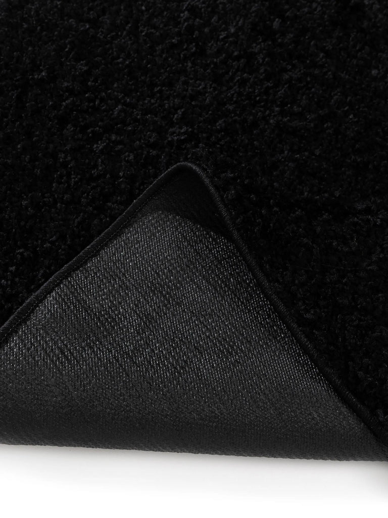 Tapis moderne uni poils longs frisés rond noir lavable 160 cm de diamètre