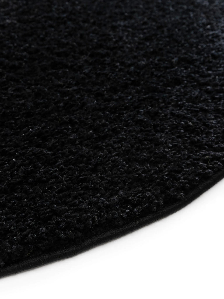 Tapis moderne uni poils longs frisés rond noir lavable 160 cm de diamètre