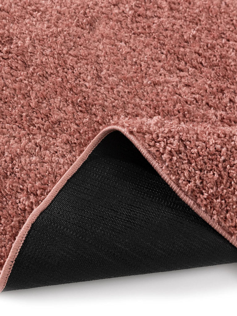 Tapis moderne uni poils longs frisés rond rose lavable 120 cm de diamètre
